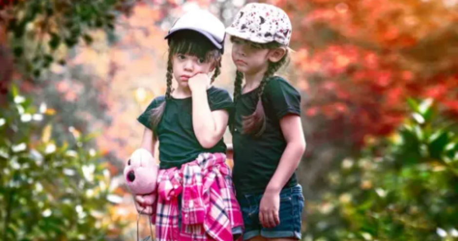 Woman Discovers Shocking Truth after Following Twin Girls Who Sit Alone in Park Every Evening